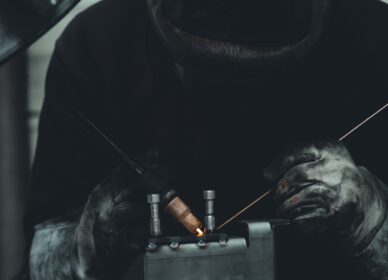 View of welder in action in a workshop